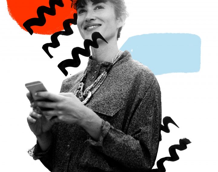 Hero image of a woman using a phone and looking happy