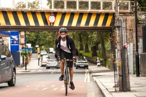 man cycling in Hackney