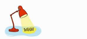 a drawing of a red desklamp casting the word spotlight in its beam