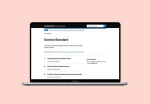 An open laptop which displays a webpage - the UK Government's Service Standard guidelines - https://www.gov.uk/service-manual/service-standard